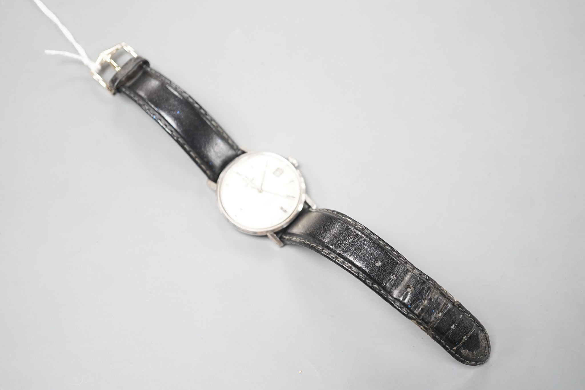 A gentleman's mid 20th century stainless steel Omega Seamaster De Ville automatic wrist watch, on associated strap.